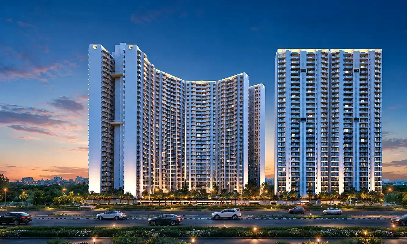 The Reserve - twin residential towers illuminated at dusk, Sinhagad Road Pune